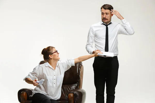 The young man and beautiful woman in business suit at office on white background — Stock Photo, Image