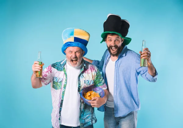 The two football fans over blue — Stock Photo, Image