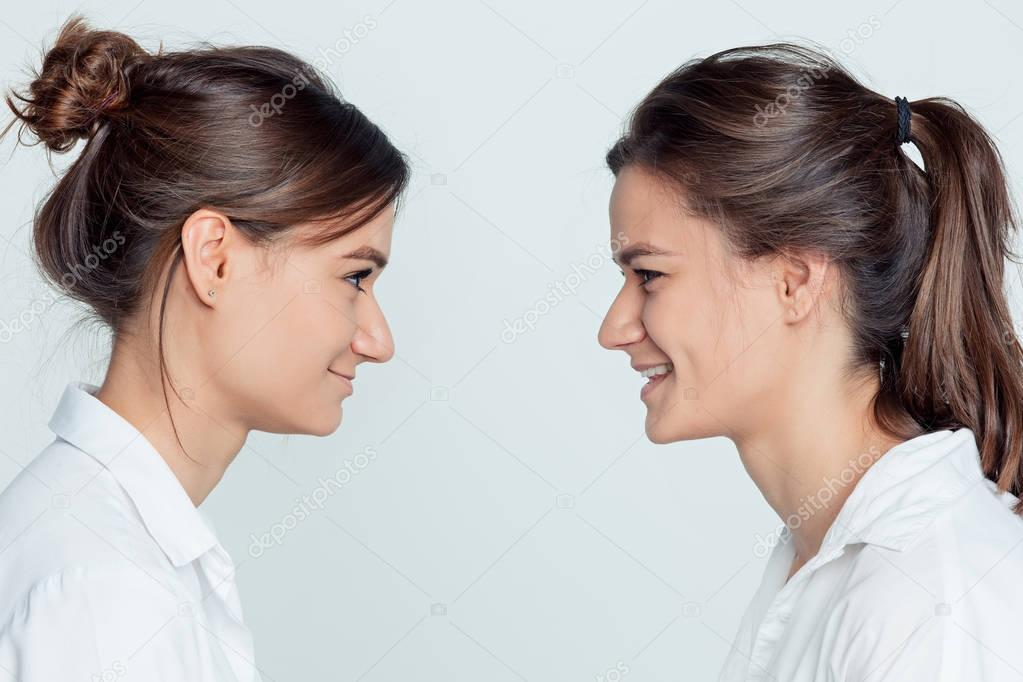 Studio portrait of female twins