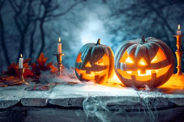 Halloween pumpkins mavi zemin üzerine