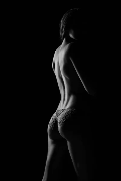 Svartvit siluett av unga, sportig och sexig kvinna i underkläder — Stockfoto