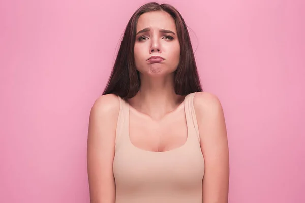 The young womans portrait with sad emotions — Stock Photo, Image