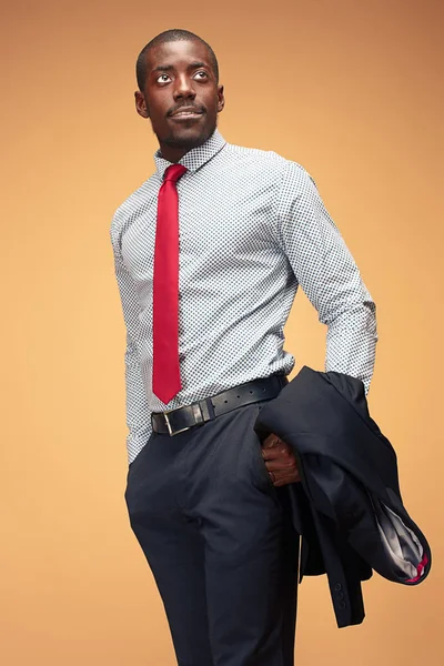 Cheerful african businessman looking at the camera — Stock Photo, Image