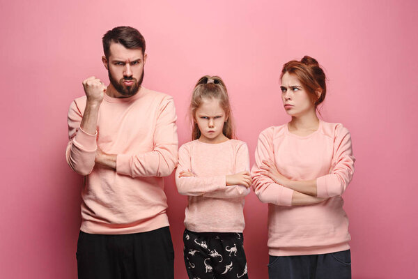 The sad family on pink