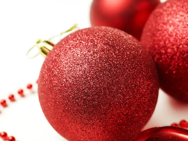 Three red christmas balls isolated on white background — Stock Photo, Image