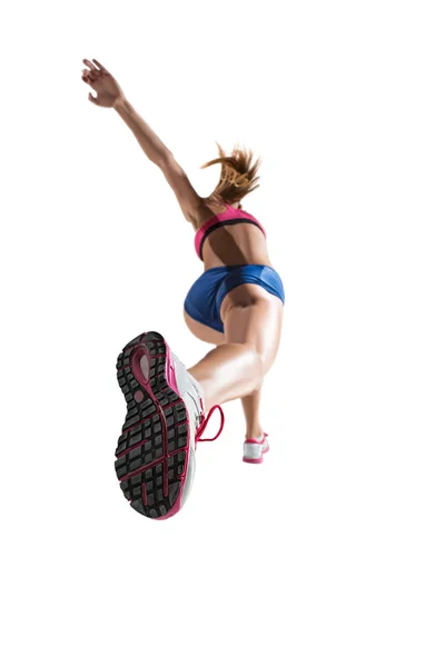 O estúdio de tiro de salto em altura atleta feminino está em ação — Fotografia de Stock
