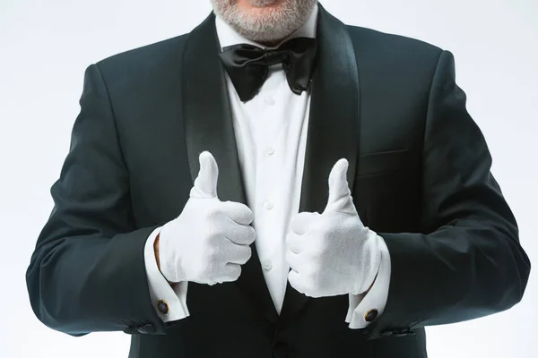 Senior waiter in white gloves — Stock Photo, Image