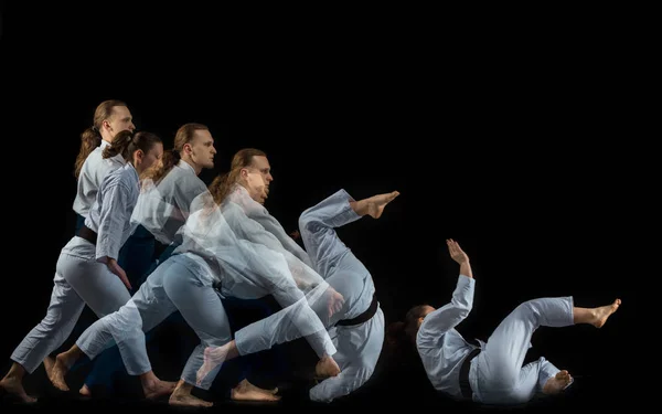 Erkek ve kadın, dövüş sanatları okulu Aikido eğitimi mücadele — Stok fotoğraf
