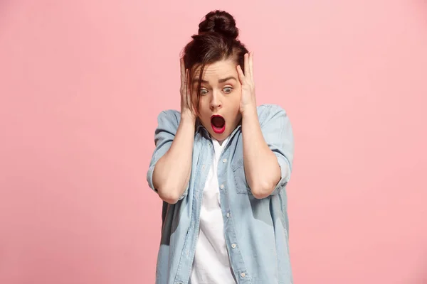 Beautiful woman looking suprised isolated on pink — Stock Photo, Image