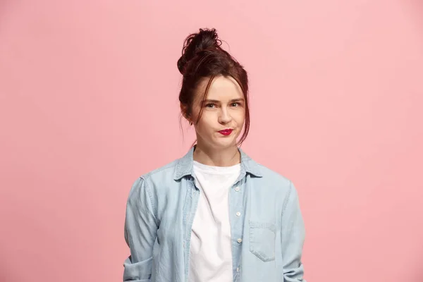 Suspiciont. Doubtful pensive woman with thoughtful expression making choice against pink background — Stock Photo, Image