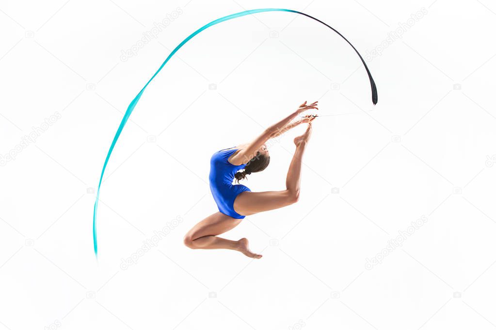 The portrait of beautiful woman gymnast on white