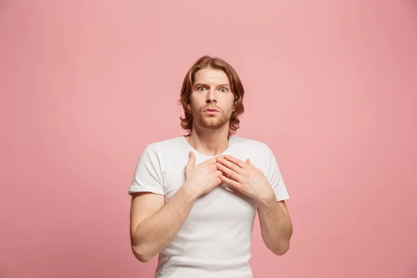 Portrait of the scared man on pink — Stock Photo, Image