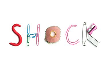 The word shock created from office stationery. clipart