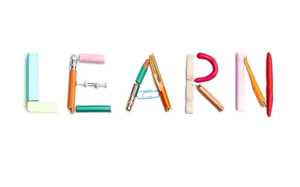 The word learn created from office stationery. — Stock Photo, Image