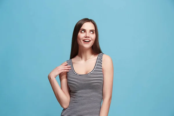 Let me think. Doubtful pensive woman with thoughtful expression making choice against blue background