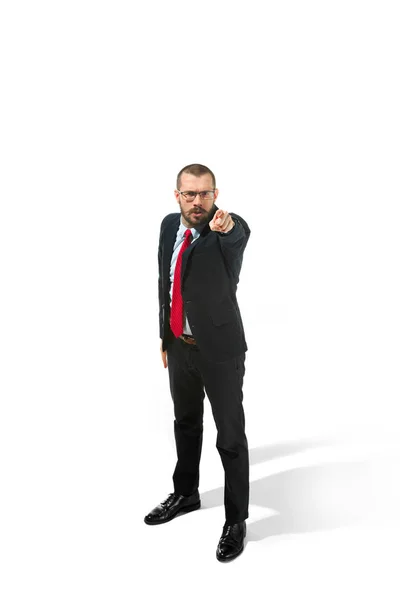 Full body portrait of happy businessman pointing to camera on white — Stock Photo, Image