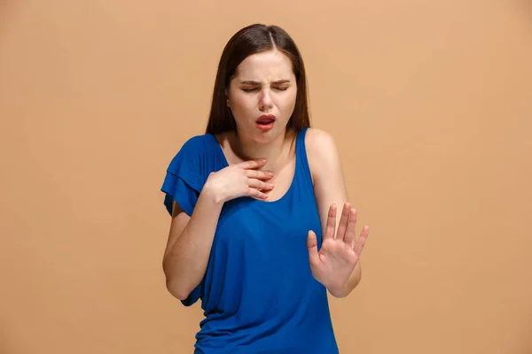 Disgust woman with thoughtful expression making choice against pastel background — Stock Photo, Image