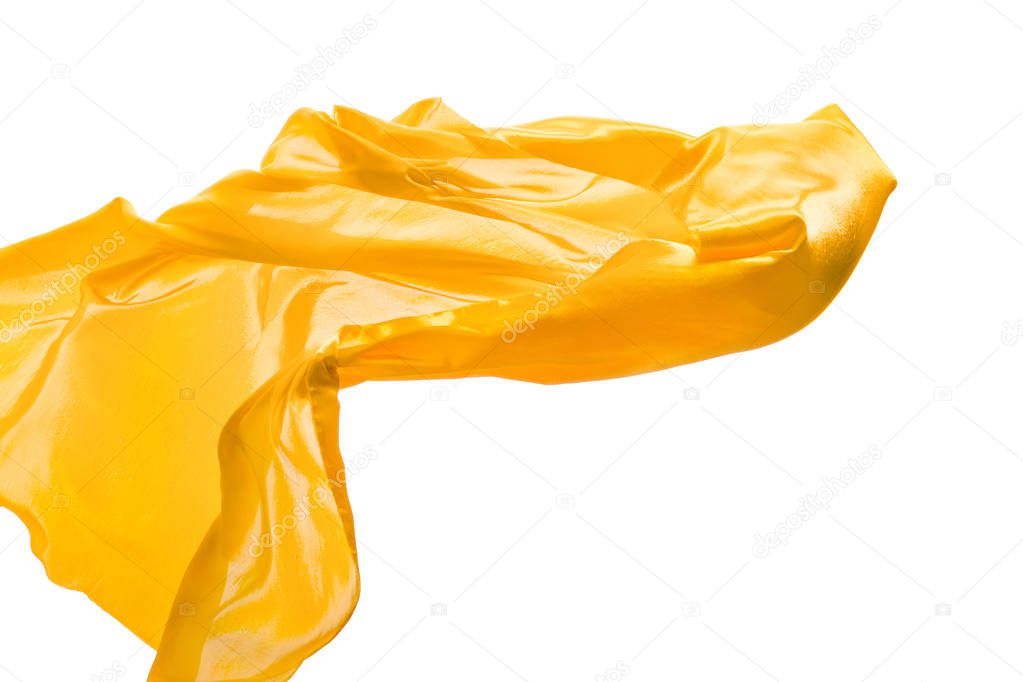 Smooth elegant transparent yellow cloth separated on white background.