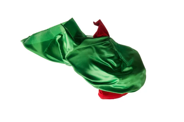 Glattes, elegantes transparentes rotes, grünes Tuch auf weißem Hintergrund. — Stockfoto