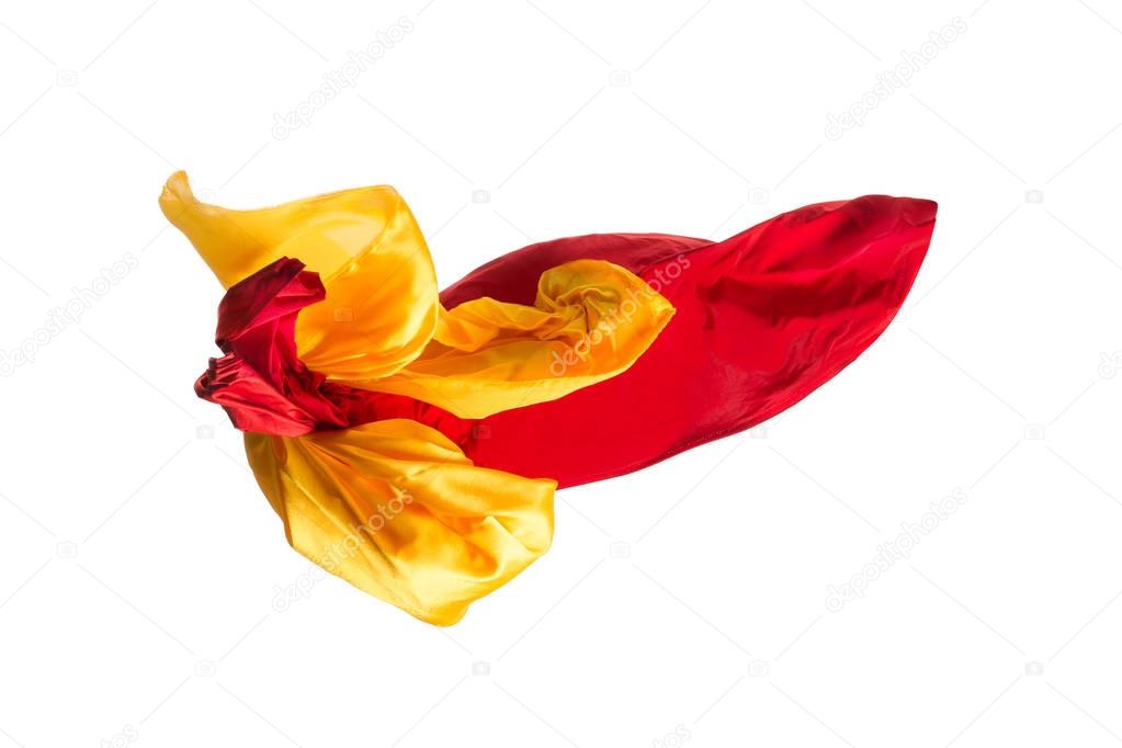 Smooth elegant transparent yellow, red, cloth separated on white background.