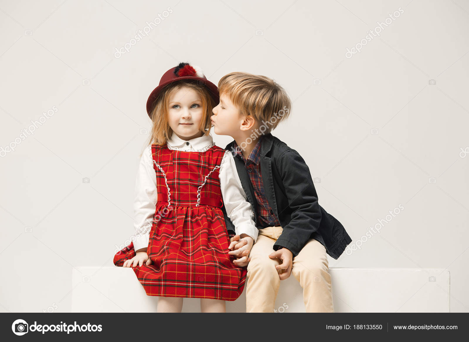 Cute stylish children on white studio background Stock Photo by  ©vova130555@ 188133550