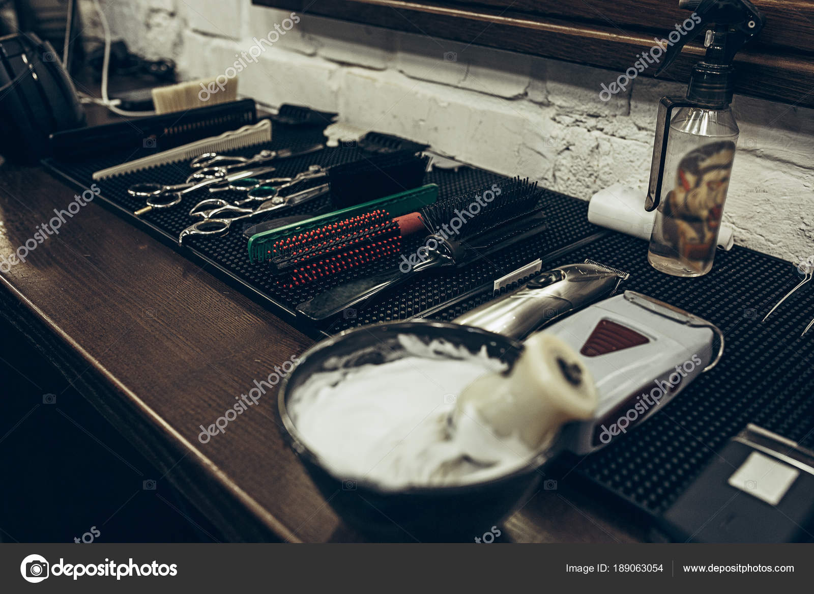 Barber shop tools on the table. Close up view shaving foam. Stock Photo