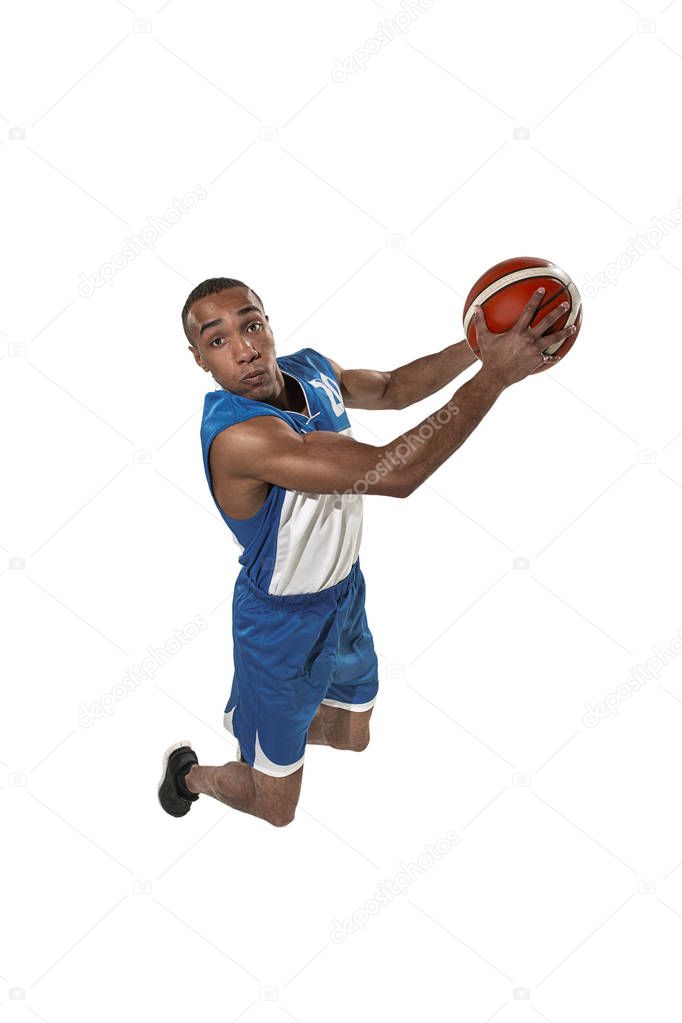 Full length portrait of a basketball player with ball