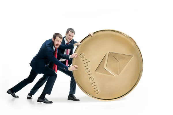 Two business men holding business icon — Stock Photo, Image