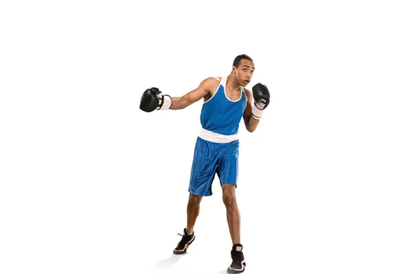 Sporty man during boxing exercise. Photo of boxer on white background Royalty Free Stock Images