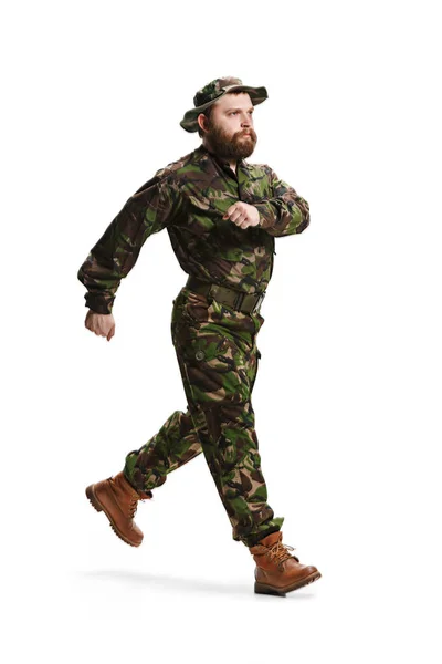 Young army soldier wearing camouflage uniform isolated on white — Stock Photo, Image