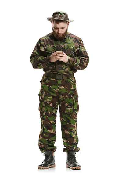 Young army soldier wearing camouflage uniform isolated on white — Stock Photo, Image