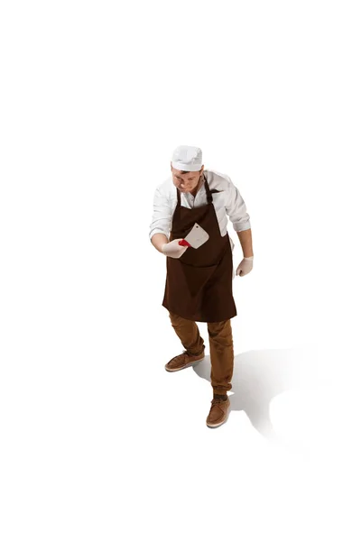 Angry aggressive butcher posing with a cleaver isolated on white background — Stock Photo, Image