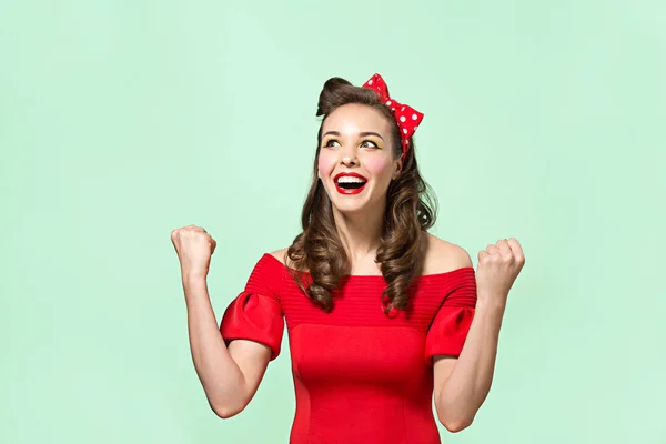 Beautiful young woman with pinup make-up and hairstyle. Studio shot on white background — Stock Photo, Image