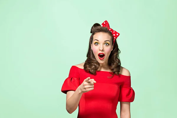 Beautiful young woman with pinup make-up and hairstyle. Studio shot on white background — Stock Photo, Image