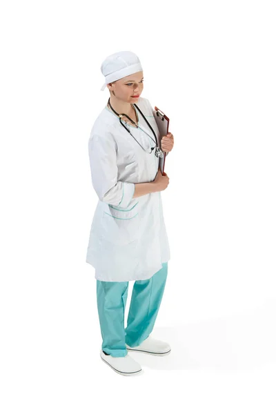 Beautiful young woman in white coat posing at studio. Full length studio shot isolated on white. — Stock Photo, Image