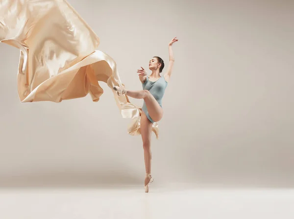 Modern ballet dancer dancing in full body on white studio background. — Stock Photo, Image