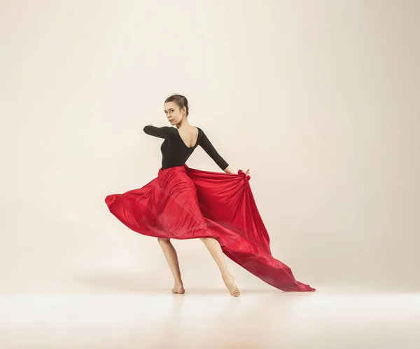 Modern ballet dancer dancing in full body on white studio background. — Stock Photo, Image