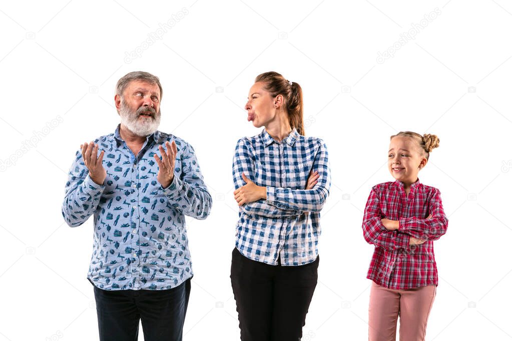 Family members arguing with one another on white studio background.