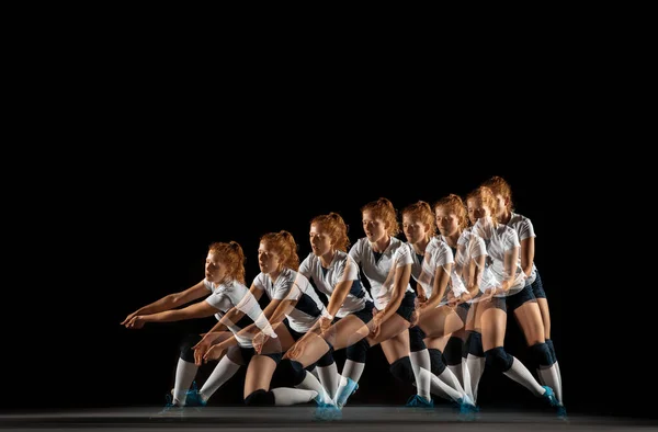 Young female volleyball player isolated on black studio background — Stock Photo, Image