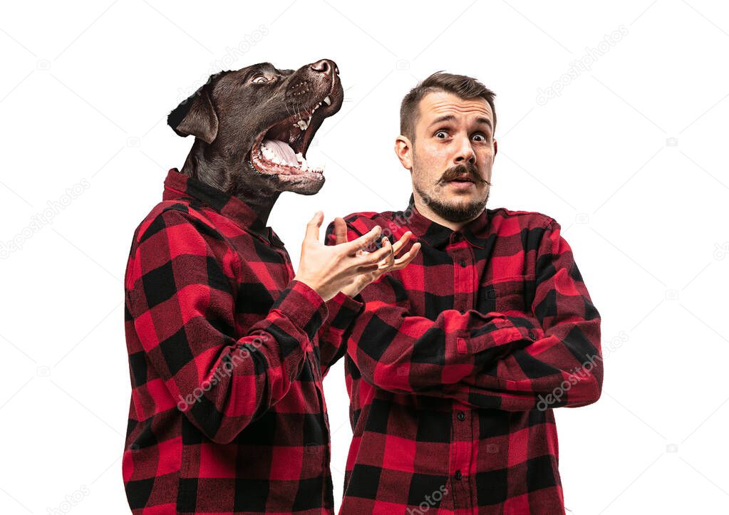 Man arguing with himself as a dog on white studio background.