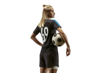 Stadyumda antrenman yapan bayan futbolcu.