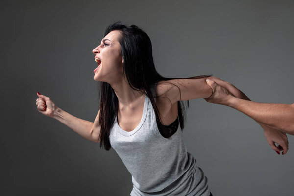 Woman being under domestic abuse and violence, concept of female rights