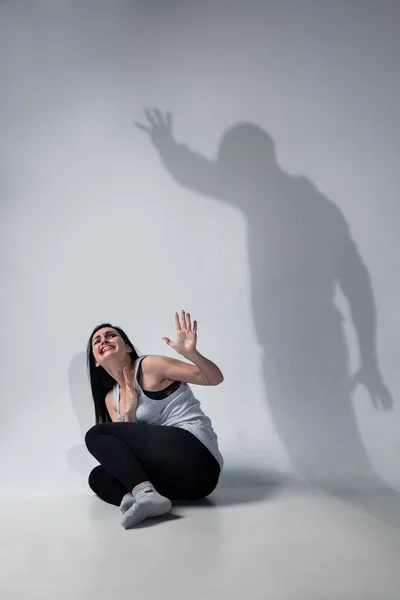 Woman being under domestic abuse and violence, concept of female rights — Stock Photo, Image