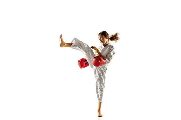 Confident junior in kimono practicing hand-to-hand combat, martial arts — Stock Photo, Image