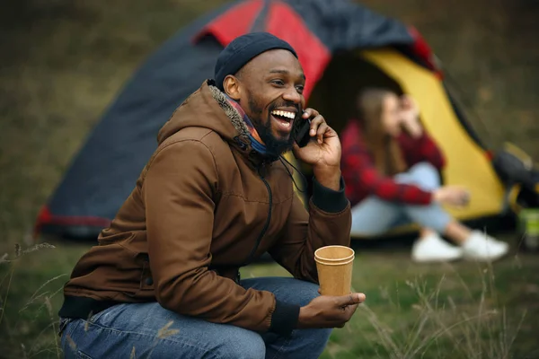 Group of friends on a camping or hiking trip in autumn day — Stock Photo, Image