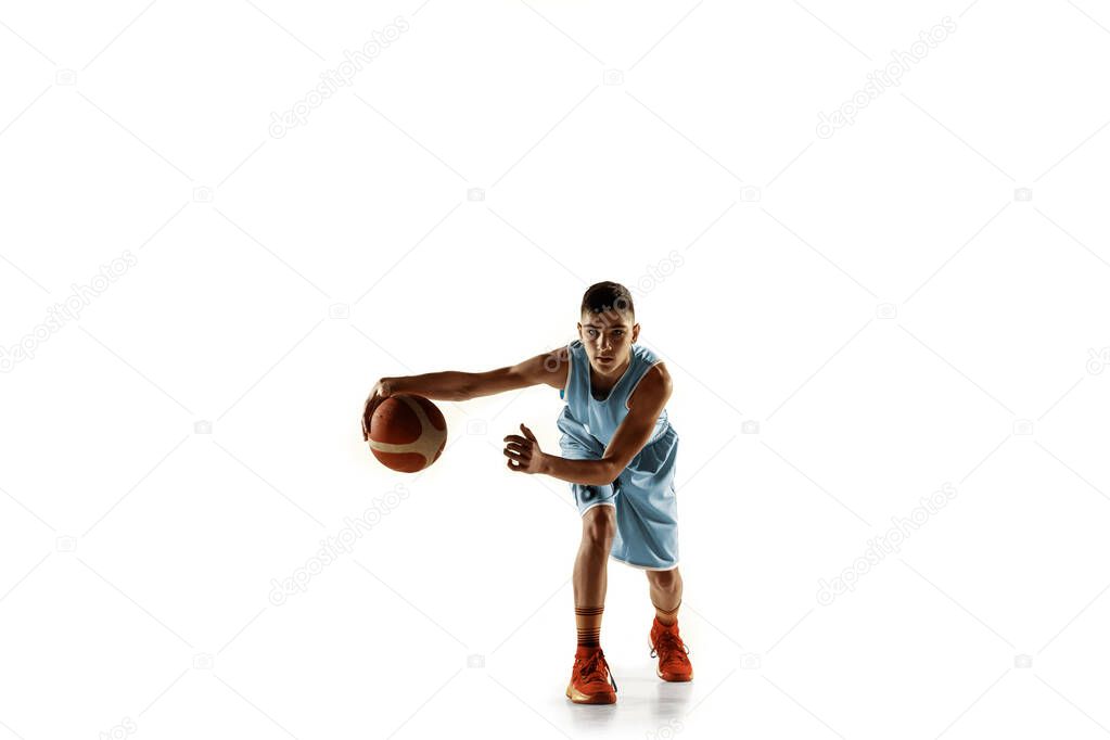 Full length portrait of a young basketball player with ball