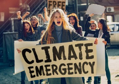 Young people protesting of climate emergency on the street clipart