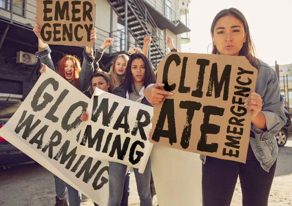 Young people protesting of climate emergency on the street