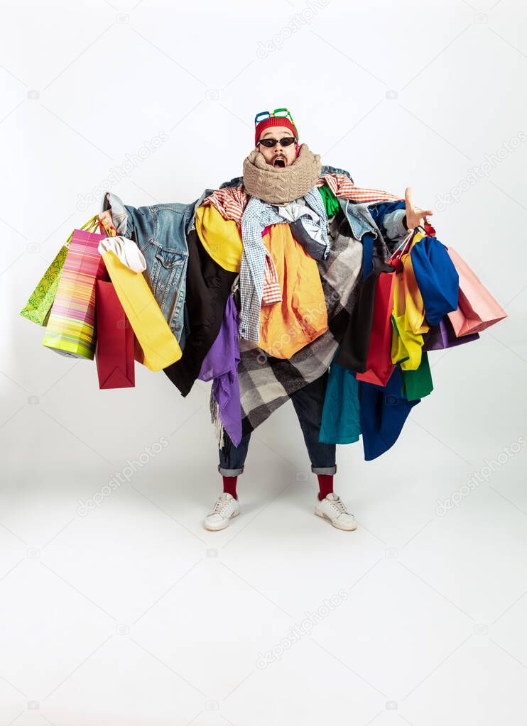 Man addicted of sales and clothes, overproduction and crazy demand