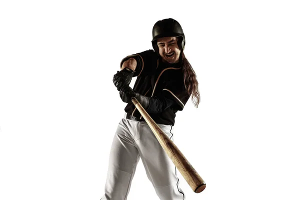 Jogador de beisebol, arremessador de uniforme preto praticando em um fundo branco . — Fotografia de Stock